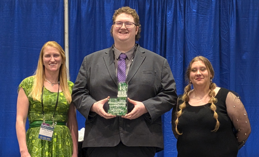 Jordan Fox (center) receives Presentation Award at SoutheastCon.