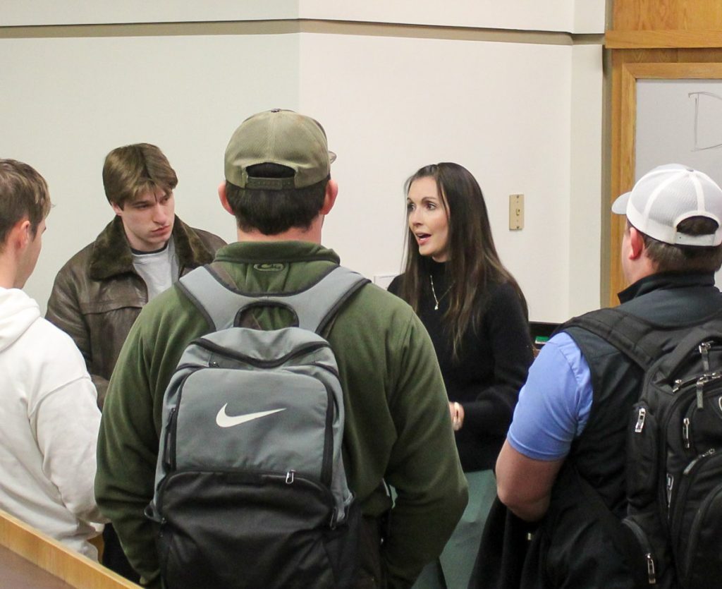 WCU construction management students meet with representatives from AWAKE Children's Advocacy Center to discuss a service project.