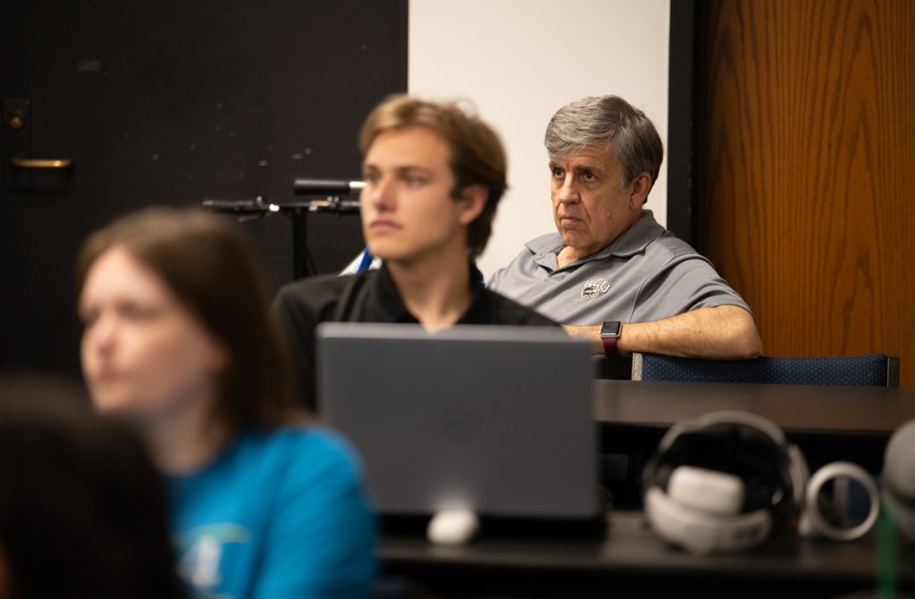 Dr. Chris Cox of WCU's College of Engineering observes virtual courtroom project presentation