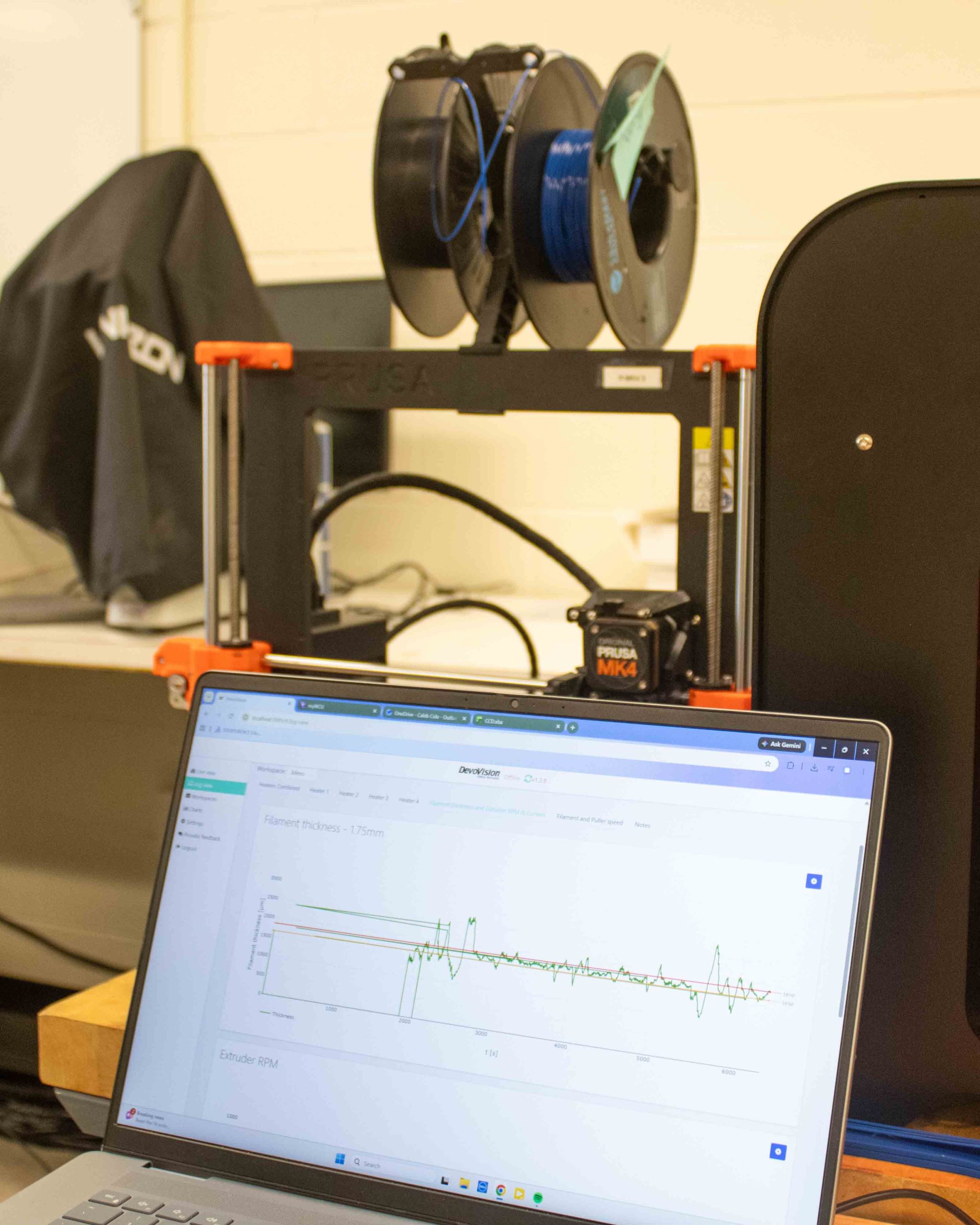 WCU MSET student Caleb Cole works on recycling system for discarded 3D printing material