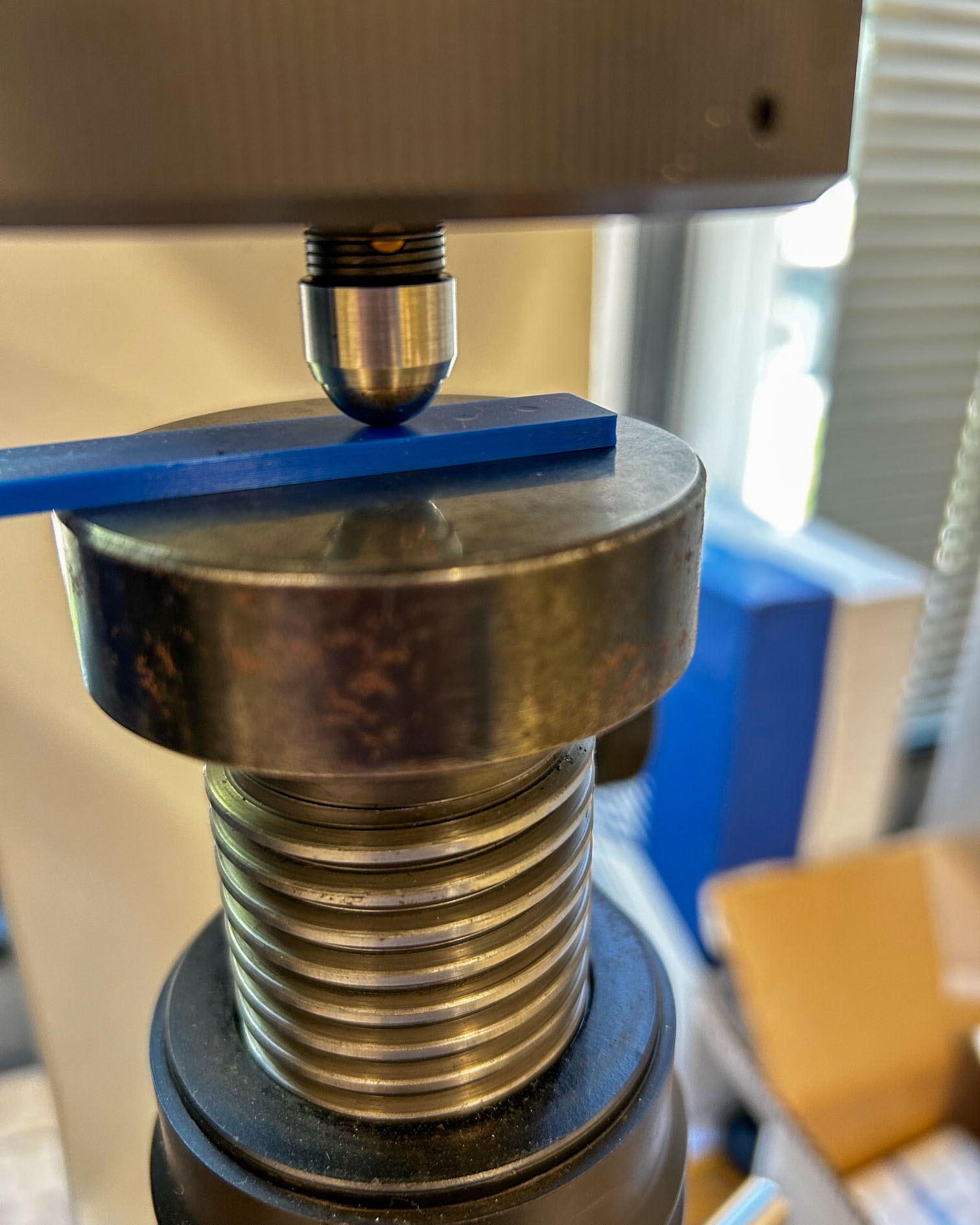 WCU MSET student Caleb Cole works on recycling system for discarded 3D printing material (Photo courtesy Caleb Cole)