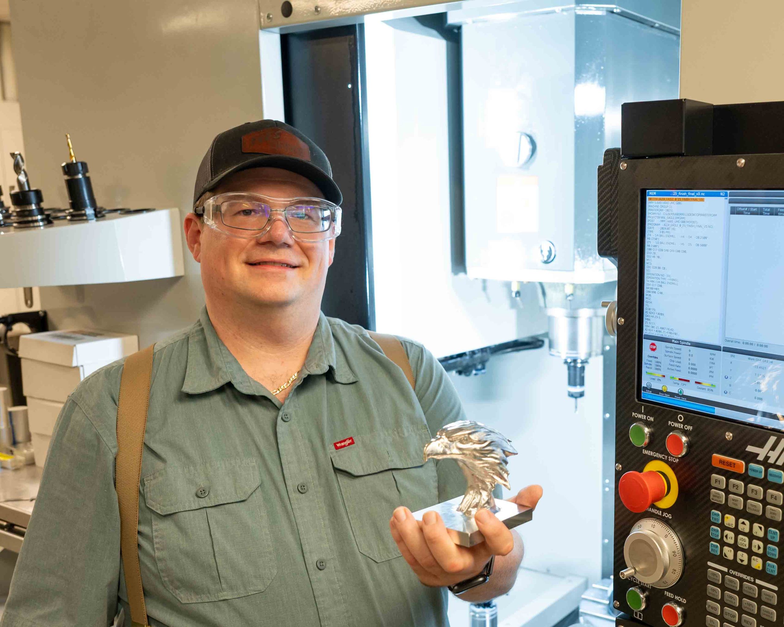 Graduate student Alex b. shows the eagle project he created