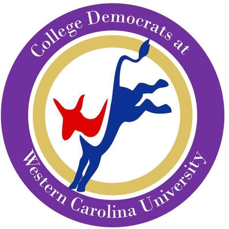 An image of the CDWCU logo, a purple ring saying "College Democrats at Western Carolina University" with a red and blue kicking donkey in the middle