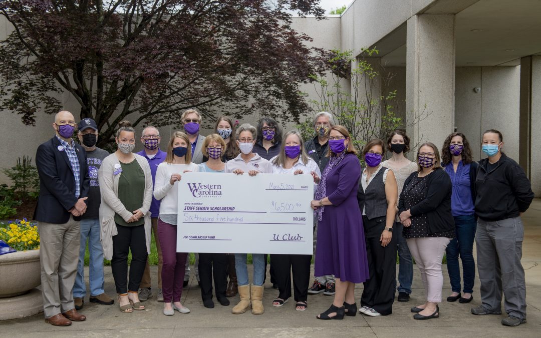 U Club Presents Fundraising Check to Chancellor Brown